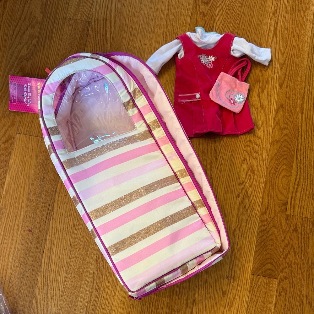 Our Generation American GirPink & Gold Striped Doll Carrier with Red Doll Outfit